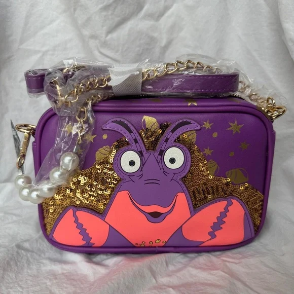 Disney Buckle-Down Moana Tamatoa Crossbody Bag NWT - Picture 1 of 4